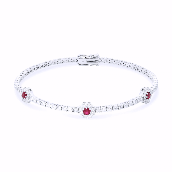 DIAMOND AND RUBY FLOWER TENNIS BRACELET